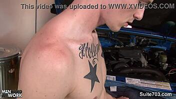 Gay pornstars engage in oral and anal sex in a garage setting