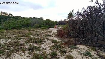 Crossdressing couple enjoys outdoor sex on the beach