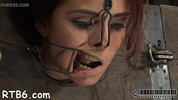 Restrained Cutie Hoisted for Rough Oral Punishment