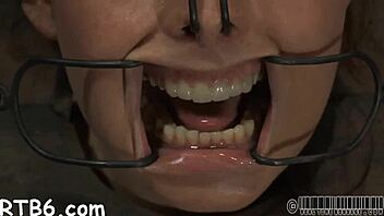 Restrained Cutie Hoisted for Rough Oral Punishment