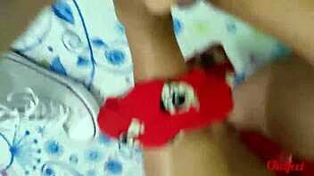 My girlfriend seduces me with her shoes and red socks, giving a footjob until I cum