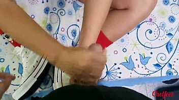 My girlfriend seduces me with her shoes and red socks, giving a footjob until I cum