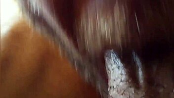 Close-up on big black cock blowjob by amateur gay performer.