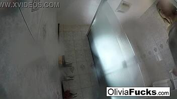 Pierced Olivia, big tits MILF pornstar, masturbates nude after long day.