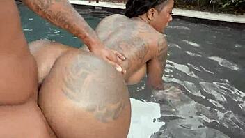 Black milf rides a massive black cock in steamy ebony action