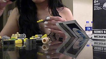 German Asian builds Lego in sexy POV.