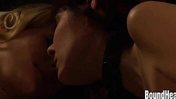 Orgasming lesbian threesome with slaves licking and diving into wet pussies.