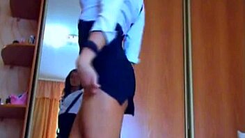 Beautiful cam girl teases in sexy skirt