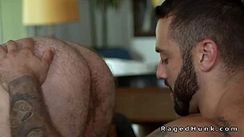 Tattooed muscle roommates banging anally in living room