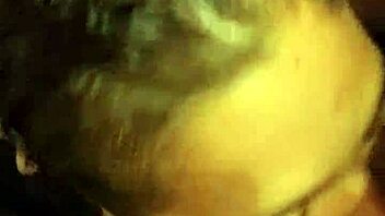 this dope whore is sucking that big black monster cock with her natural tits out