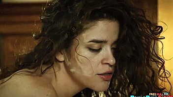 Lesbian Latinas Victoria Voxxx and Nika Venom licking pussy in bed.