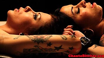 watch this lezdom mistress rule over her submissives?