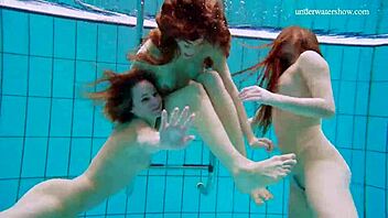 Avenna, Nina Mohnatka, and Marketa enjoy a relaxing swim in the pool together