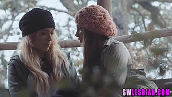Big-titted German women lick each other's pussies outdoors