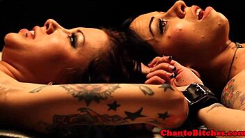 watch this lezdom mistress rule over her submissives?