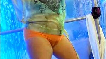 Steffi, the hotwife, dances with her watercolor pussy in solo play. Her redhead charm rips through homemade clips!