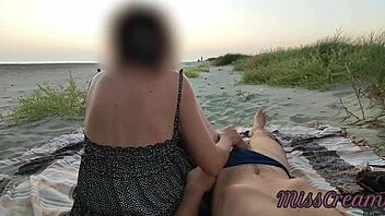 Amateur European couple explores public sex on the beach