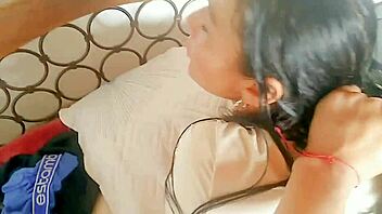 A stunning mature woman enjoys a passionate encounter, receiving a vigorous penetration from behind and having her lubricated pussy stimulated in a climactic position, all captured in high-quality 60 fps video.