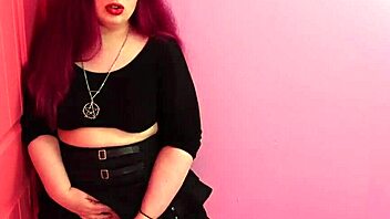 Goth transgender babe with big boobs shoots a massive cumshot in this POV video
