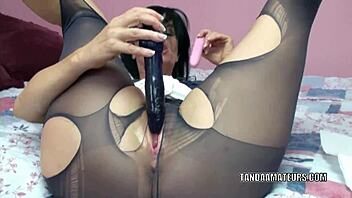 Busty milf Melissa masturbates with two dildos.