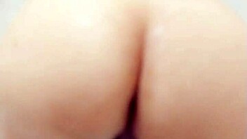 A petite Japanese wife twerking and showing her butt in a motel bathtub