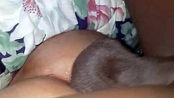 Amateur gay couple explores interracial dynamics in homemade video.