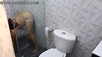 German MILF gets caught pleasuring herself in the lavatory