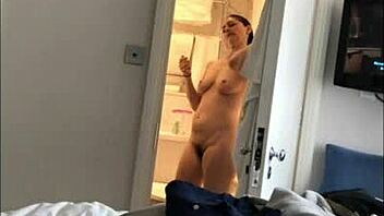 Voyeuristic footage of a milfy Karen showering
