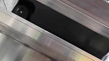 Elderly woman catches a glimpse of a bulging outline at the laundromat