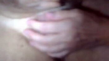 In the dark, the wife sucks his cock while I secretly record