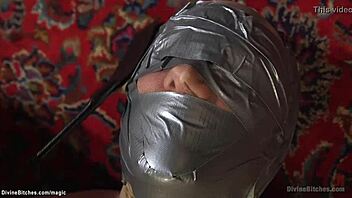 Blonde Dominatrix Pegs Tied-Up Slave Man Deep