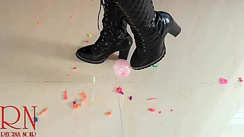 milf pops small balloons with her high heels and boots 😍