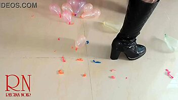 milf pops small balloons with her high heels and boots 😍