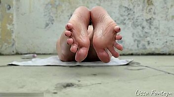 Beautiful oiled feet sunbaking, want to see more?