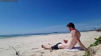 Jerking off on the beach publicly!