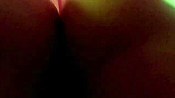 Petite man suffocated by massive breasts in a garage