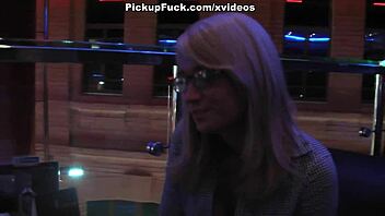 Blonde with glasses participates in outdoor public pickup
