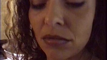 HD video of a fetish girl in rubber boots engaged in group sex