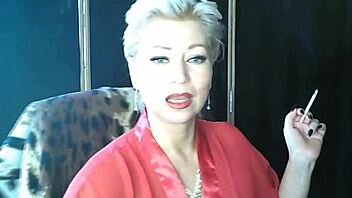 Seductive older lady in red indulges in solo pleasure