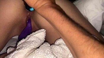 Hot chick with buttplug in shaved pussy?