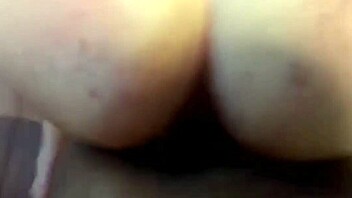 A curvy woman eagerly takes on a large black cock in a dominating sexual encounter