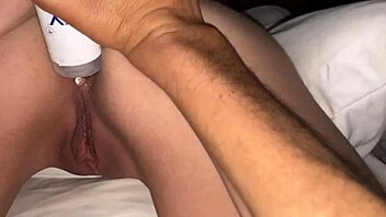 Hot chick with buttplug in shaved pussy?