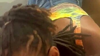 Slim beauty pleasuring a man's member on revolving office seat