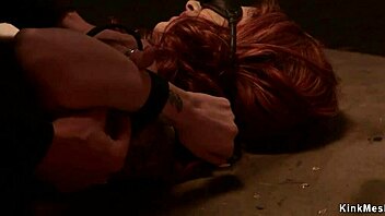 Blindfolded redhead enjoys wild tongue action