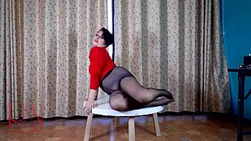 nice lady in pantyhose stripteases naked at round table fucking her big pussy