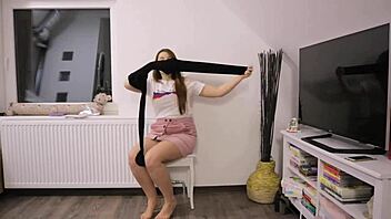 A girl enjoys playing with balloons in pantyhose and stockings