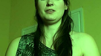 lesbian slave kneeling under her mistress's feet for total domination.