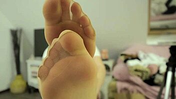 A girl enjoys playing with balloons in pantyhose and stockings