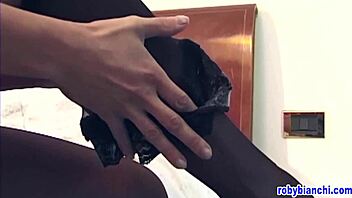 Watch Donna Denrico Play with Her Pantyhose and Big Silicone Tits in Fetish Masturbation!