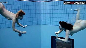 Andrea and her girlfriend Monika have fun in the pool